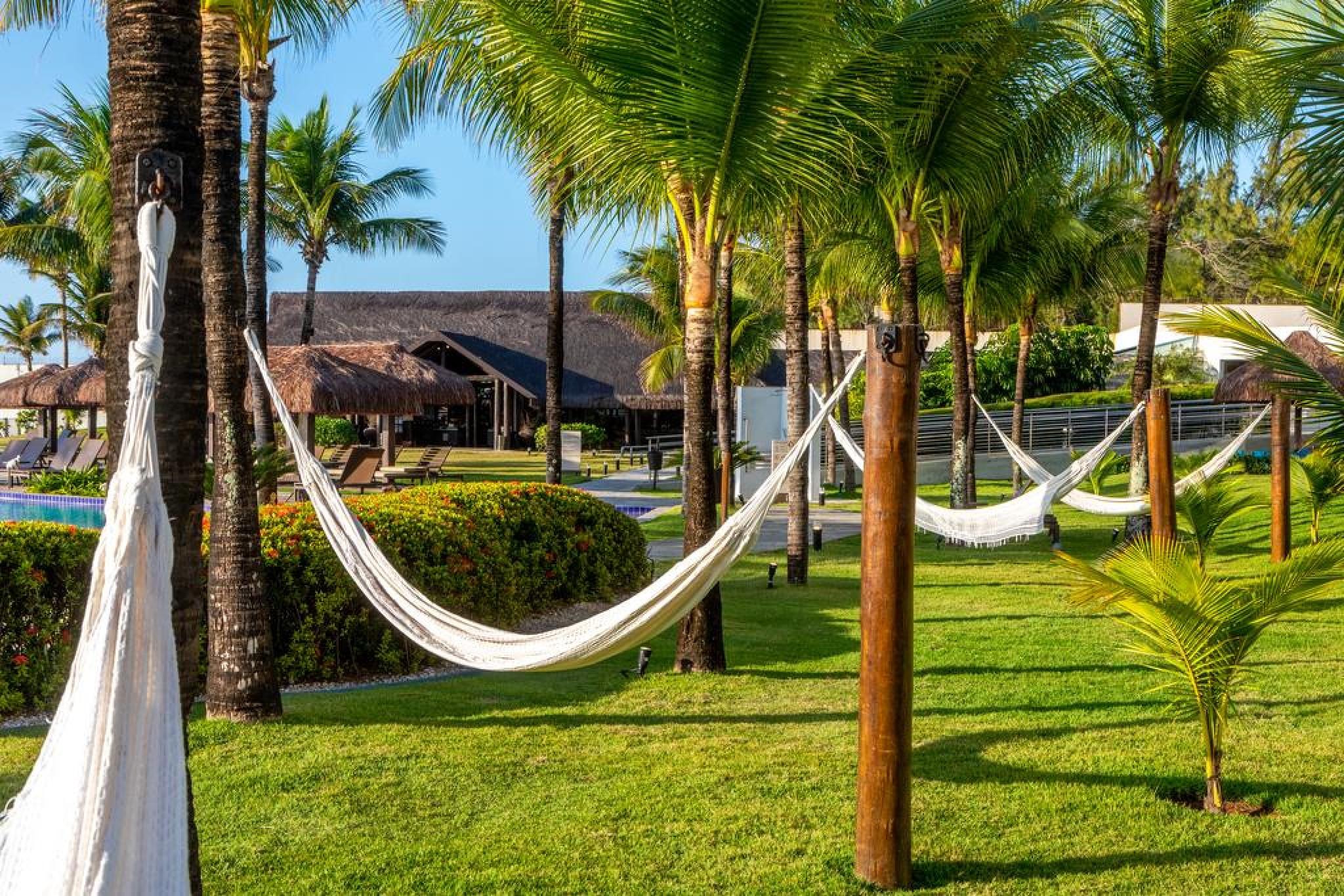 Wish Natal Hotel Exterior photo Hammocks in a resort in Brazil