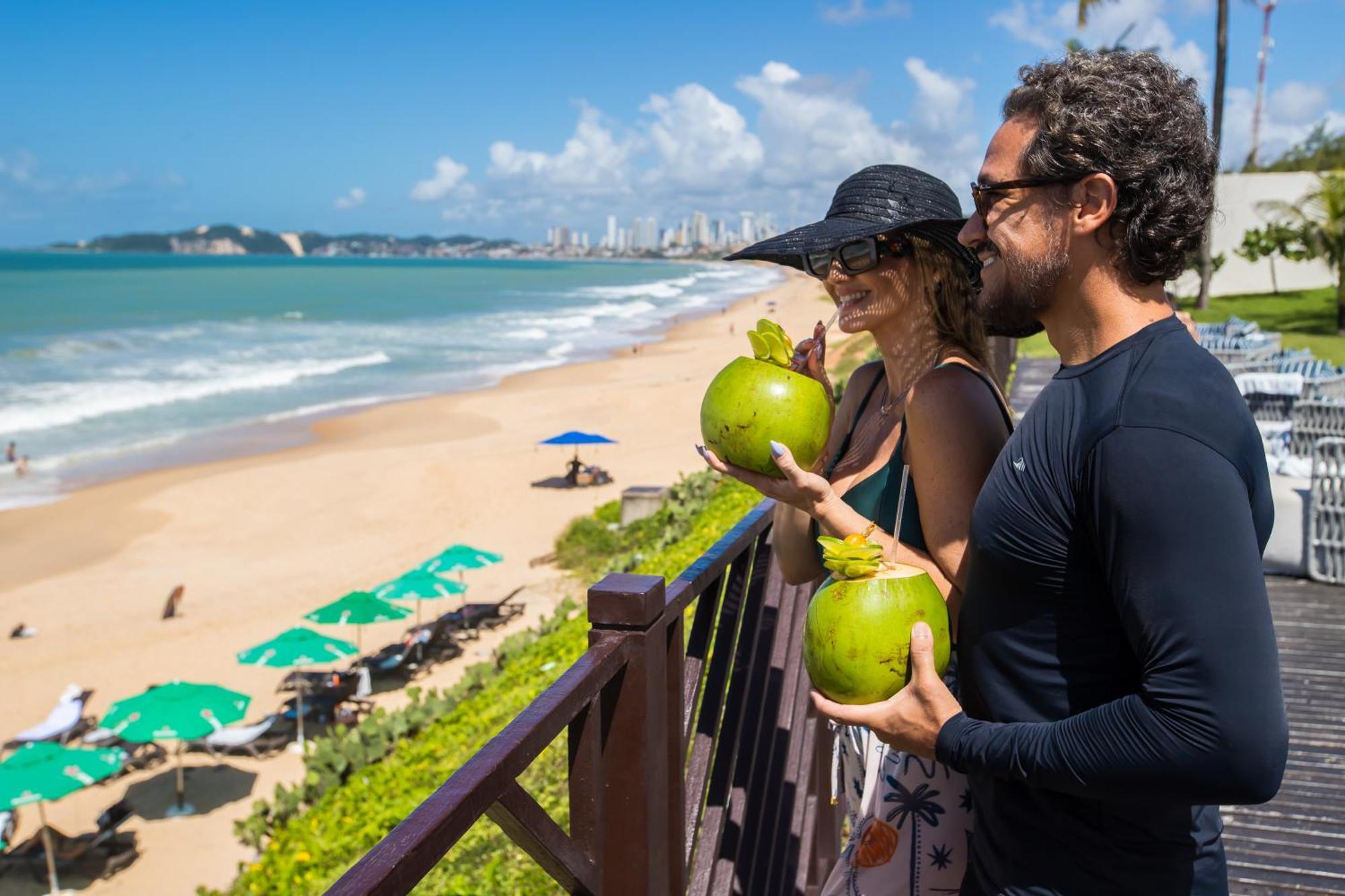 Wish Natal Hotel Exterior photo Tourists at the beach